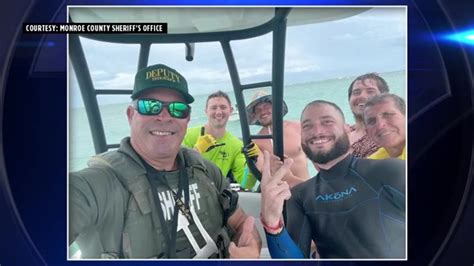5 rescued after Monroe County sheriff spots sinking boat off Marathon